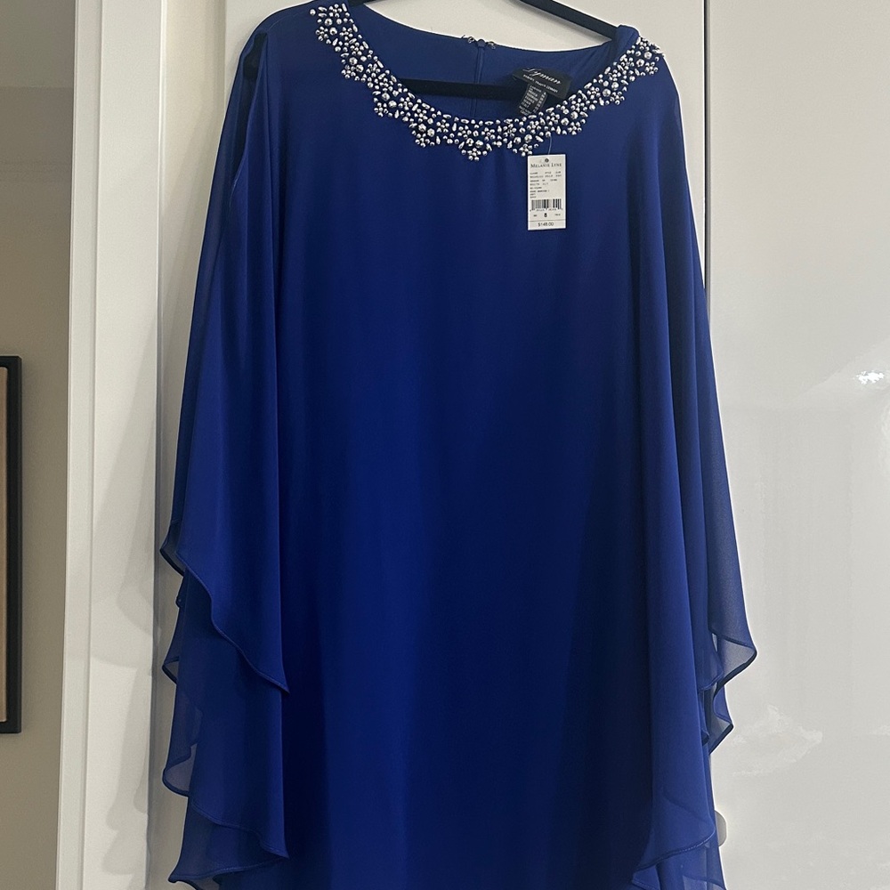 Elegant Blue Women's Top with Embellished Neckline
